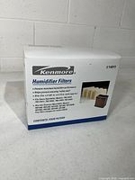 Closed box showing Kenmore branding, model 14911, contents four filters