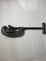 Full view of Ridgid pipe cutter showing body and handle