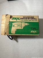 Box top showing SKIL branding and model info