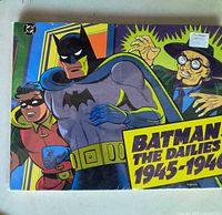 Front cover of the Batman The Dailies 1945-1946 hardcover book featuring Batman, Robin and a villain.