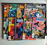 Lot of 10 The Punisher themed Marvel Comics laid out showing colorful and detailed cover art.