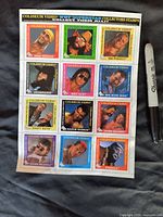 Photo shows a colorful, unused sheet of 12 WWF promotional stamps from 1993 by Coliseum Video featuring famous wrestlers including Hulk Hogan.