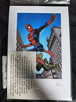 Plastic-sleeved Spiderman comic art print signed by John Romita with accompanying certificate card describing the artist's work and career.