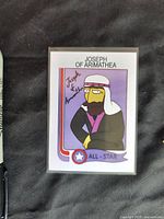 Front side of Joseph of Arimathea card showing character illustration and signature.