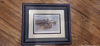 Front view of framed artwork with mat and frame