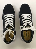Top view of the pair of black canvas Dakota WorkPro safety shoes with white laces and visible insoles.