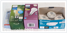 Photo showing 4 boxes of new light bulbs including Philips halogen, Philips LED, and Ecosmart LED bulbs in original packaging
