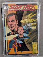 Cover of Star Trek The Next Generation Comic Issue #59 showing characters and starship with text 'Children of Chaos'