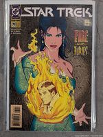 Cover of Star Trek comic issue #70 showing a female character with fire magic and an image of a man in flames, titled 'Fire and Furies'.