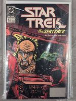 Star Trek Comic Issue #2 'The Sentence' cover showing characters and starship in comic style.