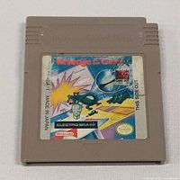 Front view of the Game Boy cartridge with label showing 'Revenge of the Cats'.