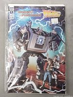 Front cover of Transformers Back to the Future Comic #1, showing a robot character and the comic title with price $3.99. The comic is sealed in a protective sleeve.