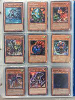 First photo showing nine Yu-Gi-Oh! cards in sleeve: U.A. Perfect Ace, UFO Turtle, Ultimate Baseball Kid, Ultimate Great Moth, a red monster, Ultimate Dragon LV3, Ultimate Insect LV7, Ultimate Tyranno, and Linsael Soul