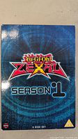 Front view of Yu-Gi-Oh! Zexal Season 1 DVD box set with logo and title visible