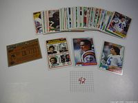 Lot of 48 vintage 1981 Topps football cards fanned out showing a mix of front and back sides. Cards appear clean and in very good condition.