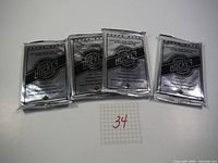 Four sealed 1992-1993 Upper Deck Hockey trading card packs to show lot quantity and condition.