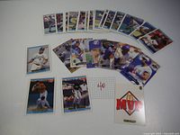Photo showing multiple 1992 McDonald's baseball cards arranged on a surface including cards of various players with some cards featuring the Blue Jays.
