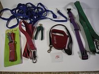 Overview of all included dog leashes, pet nail clipper, and retractable leash.