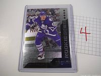 Photo of Morgan Reilly hockey card from 2013 Upper Deck Black Diamond Rookie Gems series, showing him in Toronto Maple Leafs blue uniform.