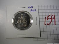 Obverse side of the 2020 Canadian 50 cent coin showing the Canadian coat of arms in uncirculated condition in protective holder.