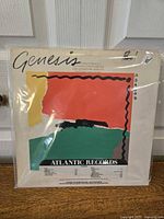 Front cover of the Genesis 'Abacab' vinyl album showing abstract multicolor design with Atlantic Records logo.
