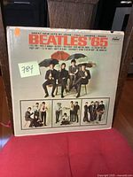 Front cover of Beatles '65 vinyl album showing artwork and album title.