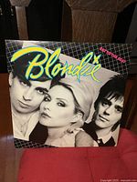 Front cover of Blondie Eat to the Beat album showing band members and title in colorful lettering.