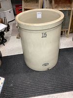 Front view of large Medalta 15 gallon stoneware crock showing its size and shape.