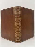 Front view of the book showing the spine with the title 'Ingoldsby Legends' and ornate gilt decorations in full brown leather binding.
