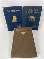 Front covers of three Canadian poetry books: "The Habitant and Other French Canadian Poems", "Songs of A Shanty-Man", and "The Leather Bottle". Cloth bound hardcovers with gold embossed titles and illustrations.