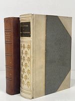 Two vintage Robert Browning books standing side by side, showing their bindings and spines.