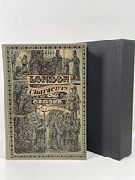 Front cover and slipcase of the book showing title and detailed Victorian illustrations