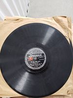 Duke Ellington Brunswick m8108 78 RPM record with label showing The Gal From Joe's / I Let a Song Go Out of My Heart, with minor red label sticker.