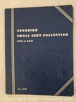 Blue folder cover titled 'Canadian Small Cent Collection 1920 to Date' with gold lettering and rope design detail