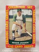 Photo of the front of the original box showing Reggie Jackson and indicating the set contains 110 cards from the Trading Card Series.
