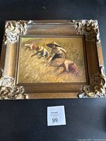 Front view of framed oil painting showing artwork and ornate frame
