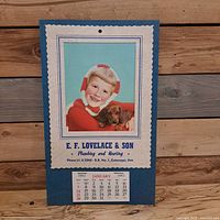 Front view showing child and dog image, company information, January 1962 page