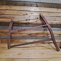 Full view of buck saw showing frame, blade, and tensioner