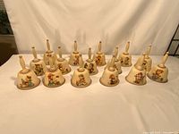 Front view of all 15 Goebel Hummel bells