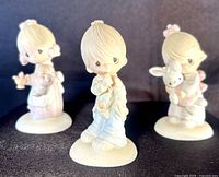 All three figurines front view