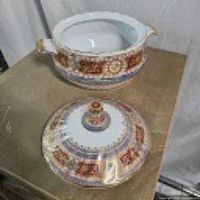 tureen base interior and lid separated to show both pieces