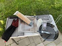 Overview of assorted BBQ tools on table