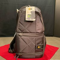 Front view of Case Logic backpack with tag attached