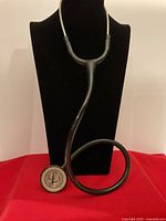 Full view of Littmann Classic II stethoscope on stand