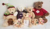 Group shot of all nine Gund plush toys