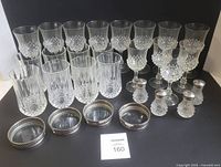 Group shot of all glasses, coasters, shakers