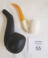 Pipe and closed leather case side by side