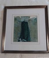 Frontal photo showing the full framed watercolor artwork with double matting and silver frame.