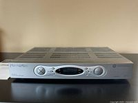 Front view of Motorola DCT3416 I set-top box showing control buttons and display