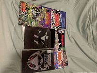 Three Shadowhawk comic books arranged horizontally, showcasing the diverse and colorful cover arts.